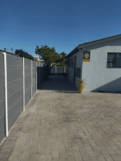 Secure parking courtyard 60 on Kosmos guesthouse Bellville South - safe vehicle storage Cape Town accommodation with high walls and CCTV