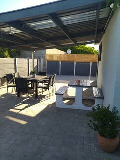 Additional outdoor space at 60 on Kosmos guesthouse with seating