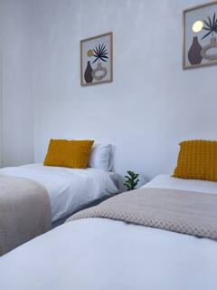 Standard twin room bathroom at 60 on Kosmos with ensuite shower